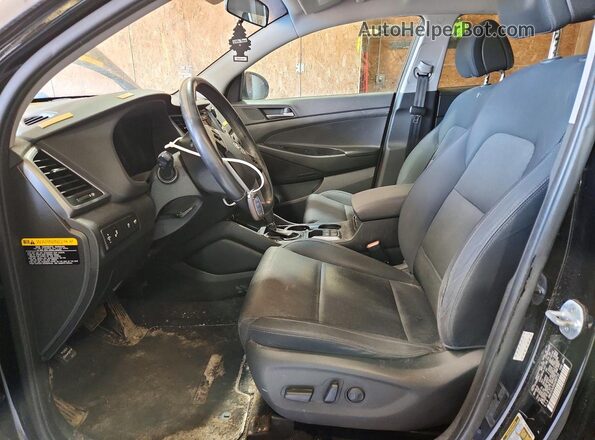 KM8J3CA26GU080710 2016 HYUNDAI TUCSON Black Front interior view