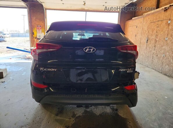 KM8J3CA26GU080710 2016 HYUNDAI TUCSON Black Rear view