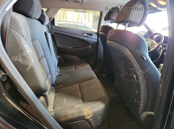 KM8J3CA26GU080710 2016 HYUNDAI TUCSON Black Rear interior view