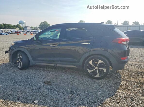 KM8J3CA27GU059042 2016 HYUNDAI TUCSON Black Trasero izquierdo