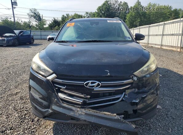 KM8J3CA27GU059042 2016 HYUNDAI TUCSON Black Vista frontal