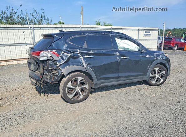 KM8J3CA27GU059042 2016 HYUNDAI TUCSON Black Trasero derecho