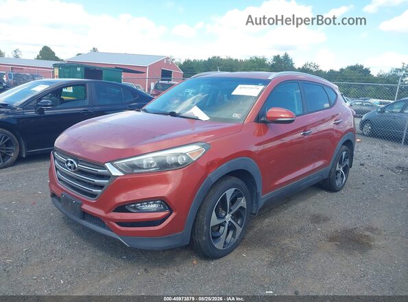 KM8J3CA28GU057770 2016 HYUNDAI TUCSON Orange Vista tres cuartos delantera izquierda