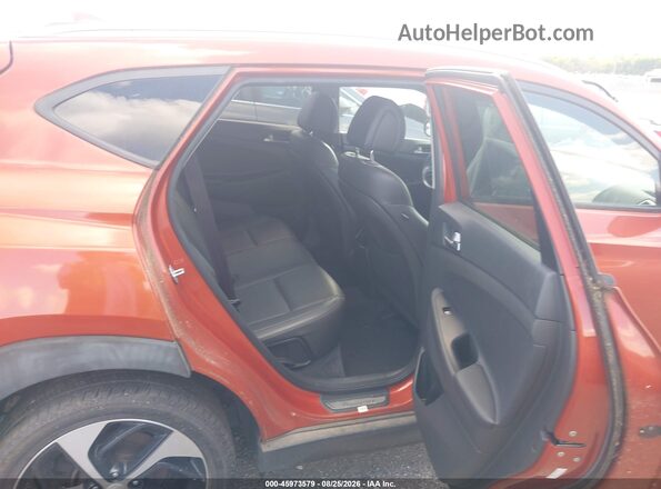 KM8J3CA28GU057770 2016 HYUNDAI TUCSON Orange Vista de la etiqueta del VIN