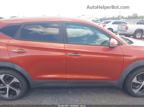 KM8J3CA28GU057770 2016 HYUNDAI TUCSON Orange Vista interior trasera