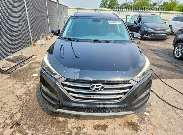 KM8J3CA28GU236262 2016 HYUNDAI TUCSON Black Front view