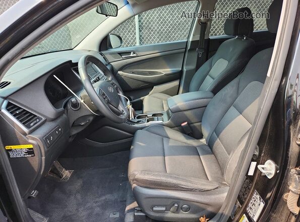 KM8J3CA28GU236262 2016 HYUNDAI TUCSON Black Front interior view