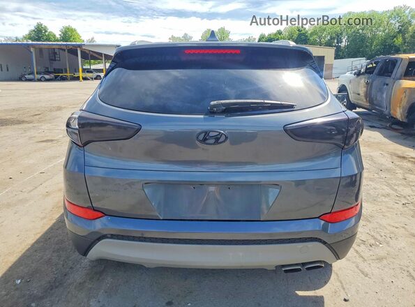 KM8J3CA28HU393517 2017 HYUNDAI TUCSON Gray Հետևի տեսք