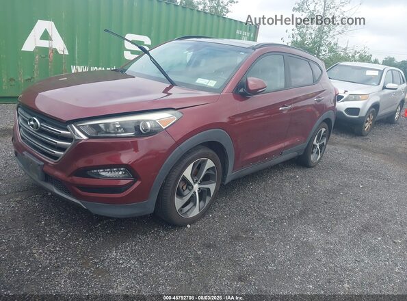 KM8J3CA29GU120696 2016 HYUNDAI TUCSON Maroon Vista tres cuartos delantera izquierda