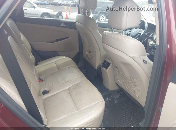 KM8J3CA29GU120696 2016 HYUNDAI TUCSON Maroon Vista de la etiqueta del VIN