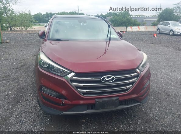 KM8J3CA29GU120696 2016 HYUNDAI TUCSON Maroon Vista del cuadro de instrumentos