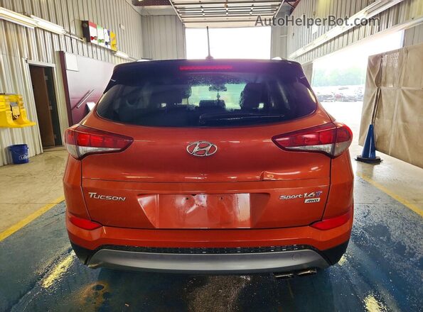 KM8J3CA29GU202136 2016 HYUNDAI TUCSON Red Հետևի տեսք