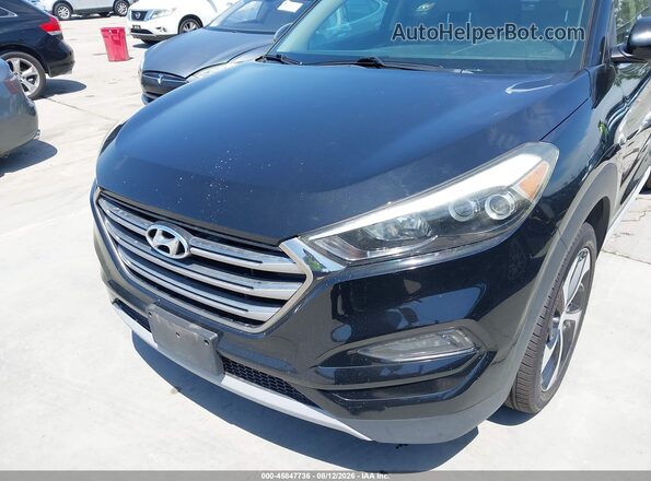 KM8J3CA29HU394644 2017 HYUNDAI TUCSON Black Դիմացի տեսք