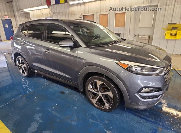 KM8J3CA2XGU035821 2016 HYUNDAI TUCSON Gray 