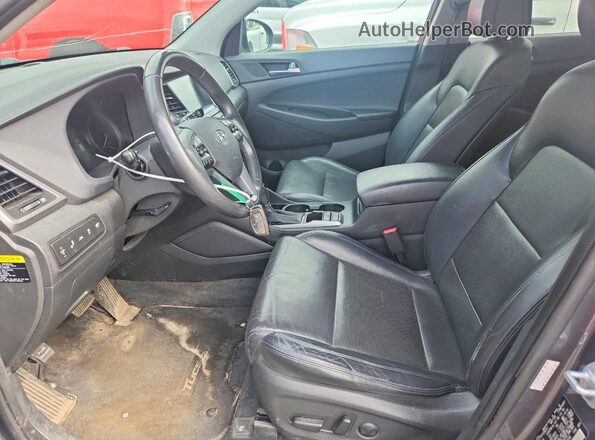 KM8J3CA2XGU179255 2016 HYUNDAI TUCSON Gray Widok wnętrza z przodu