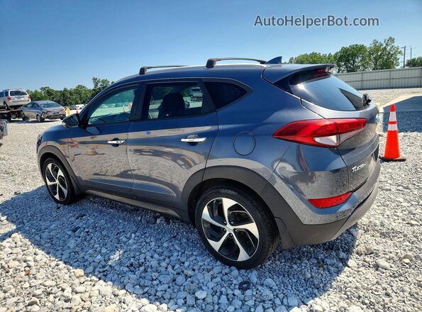 KM8J3CA2XGU251698 2016 HYUNDAI TUCSON Gray Tył lewy