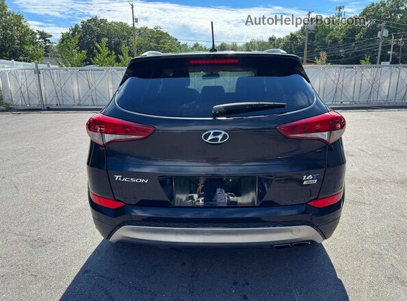 KM8J3CA2XHU281995 2017 HYUNDAI TUCSON Black Вид ззаду