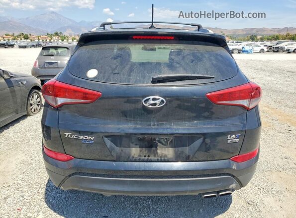 KM8J3CA2XHU289952 2017 HYUNDAI TUCSON Черный Вид сзади