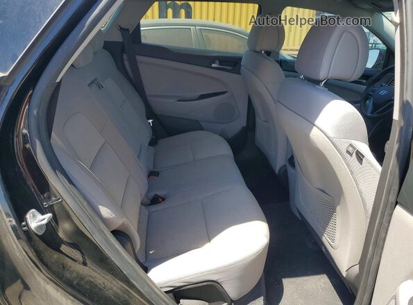KM8J3CA2XHU289952 2017 HYUNDAI TUCSON Черный Вид задней части салона