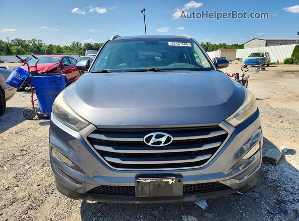 KM8J3CA41GU087954 2016 HYUNDAI TUCSON Gray Widok z przodu