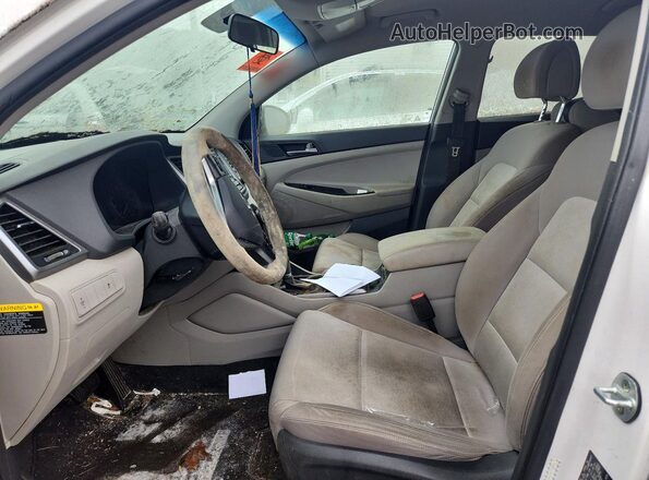 KM8J3CA41GU166914 2016 HYUNDAI TUCSON White Front interior view