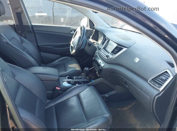 KM8J3CA41HU409784 2017 HYUNDAI TUCSON Black Vista interior delantera