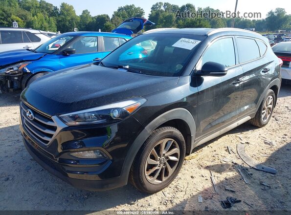 KM8J3CA41HU409784 2017 HYUNDAI TUCSON Black Vista tres cuartos delantera izquierda