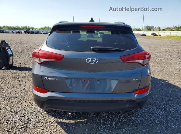KM8J3CA41HU577005 2017 HYUNDAI TUCSON Gray Widok z tyłu