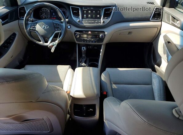 KM8J3CA41HU577005 2017 HYUNDAI TUCSON Gray Widok deski rozdzielczej