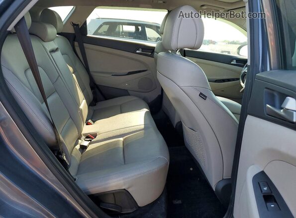 KM8J3CA41HU577005 2017 HYUNDAI TUCSON Gray Widok wnętrza z tyłu