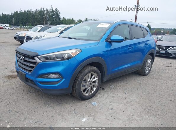 KM8J3CA43GU036696 2016 HYUNDAI TUCSON Blue Front left