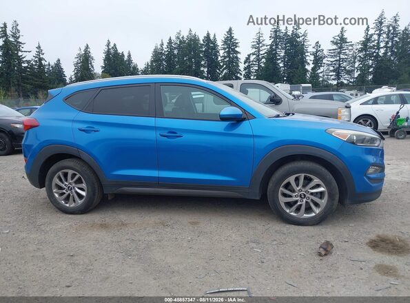 KM8J3CA43GU036696 2016 HYUNDAI TUCSON Blue Rear interior view