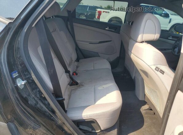 KM8J3CA44JU722401 2018 HYUNDAI TUCSON Black Widok wnętrza z tyłu