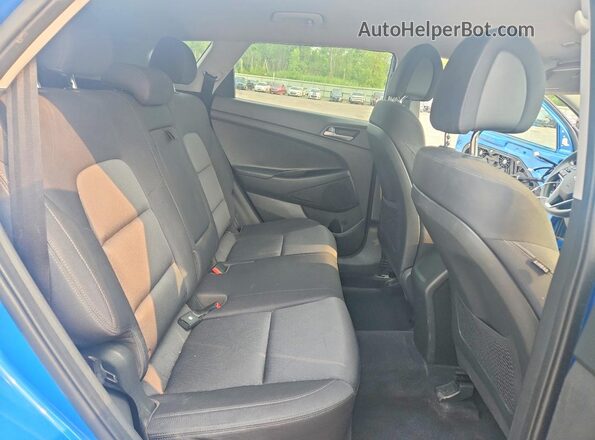 KM8J3CA44JU735004 2018 HYUNDAI TUCSON Blue უკანა სალონის ხედი