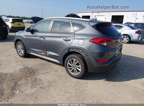 KM8J3CA44JU753213 2018 HYUNDAI TUCSON Gray Rear left