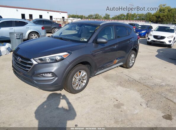 KM8J3CA44JU753213 2018 HYUNDAI TUCSON Gray წინა მარცხენა ხედი სამი მეოთხედიდან