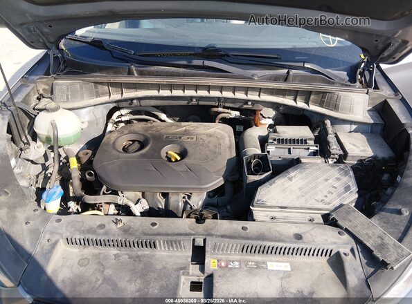 KM8J3CA44JU753213 2018 HYUNDAI TUCSON Gray Rear view