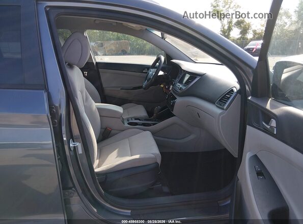 KM8J3CA44JU753213 2018 HYUNDAI TUCSON Gray Front interior view