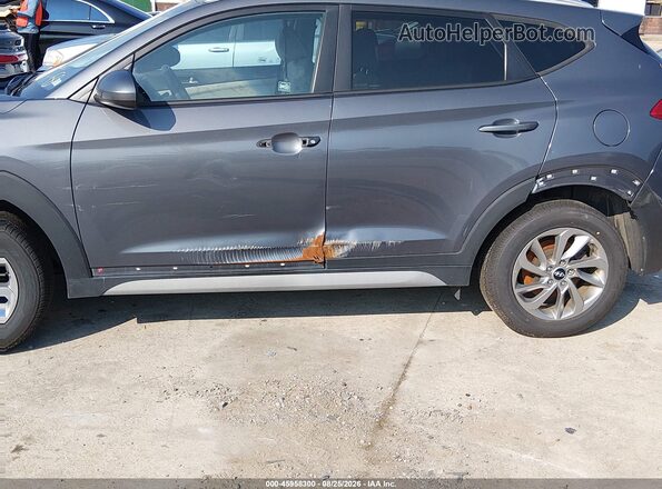 KM8J3CA44JU753213 2018 HYUNDAI TUCSON Gray Front view