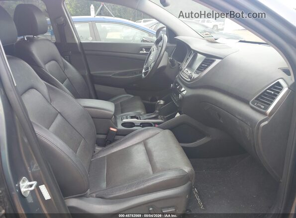 KM8J3CA45HU413885 2017 HYUNDAI TUCSON Gray Widok wnętrza z przodu