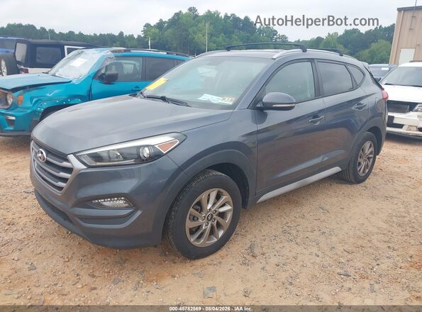 KM8J3CA45HU413885 2017 HYUNDAI TUCSON Gray Przód lewy