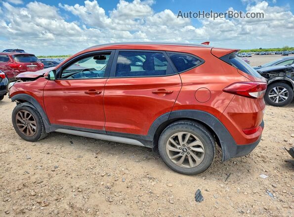 KM8J3CA45HU460950 2017 HYUNDAI TUCSON Orange Trasero izquierdo