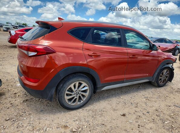 KM8J3CA45HU460950 2017 HYUNDAI TUCSON Orange Trasero derecho