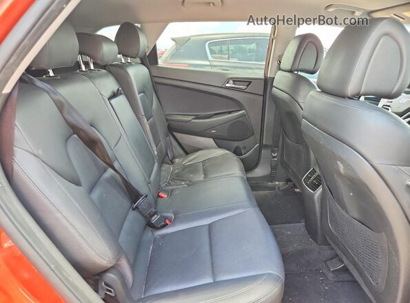 KM8J3CA45HU460950 2017 HYUNDAI TUCSON Orange Vista de los asientos traseros