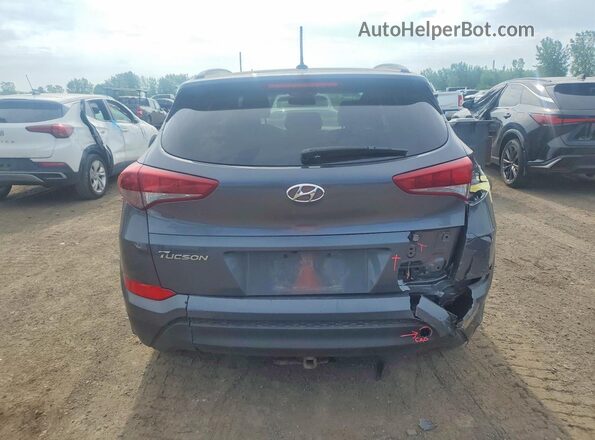 KM8J3CA45HU510052 2017 HYUNDAI TUCSON Gray Вид ззаду