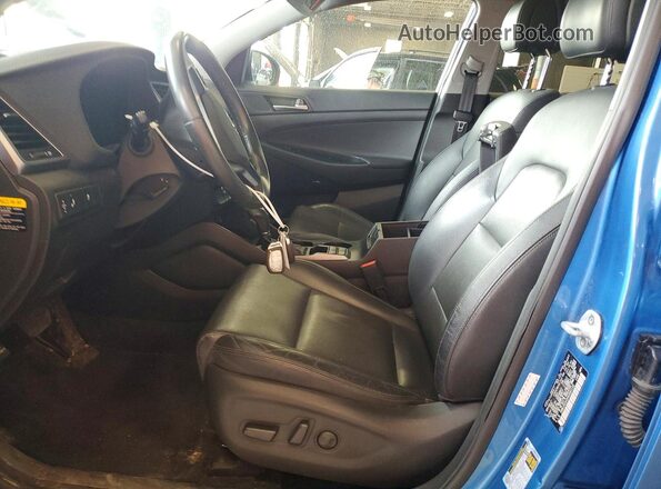 KM8J3CA45HU583132 2017 HYUNDAI TUCSON Blue წინა სალონის ხედი