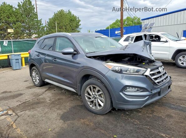 KM8J3CA45JU608357 2018 HYUNDAI TUCSON Gray Delantero derecho