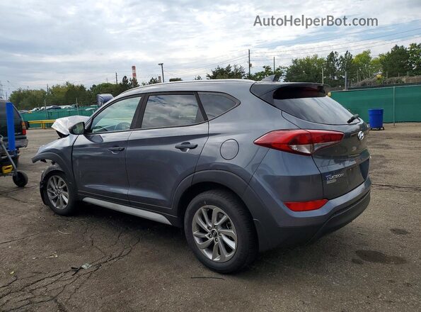 KM8J3CA45JU608357 2018 HYUNDAI TUCSON Gray Trasero izquierdo