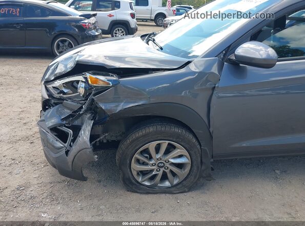 KM8J3CA46GU213984 2016 HYUNDAI TUCSON Gray 