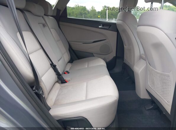 KM8J3CA46HU256450 2017 HYUNDAI TUCSON Gray VIN sticker view
